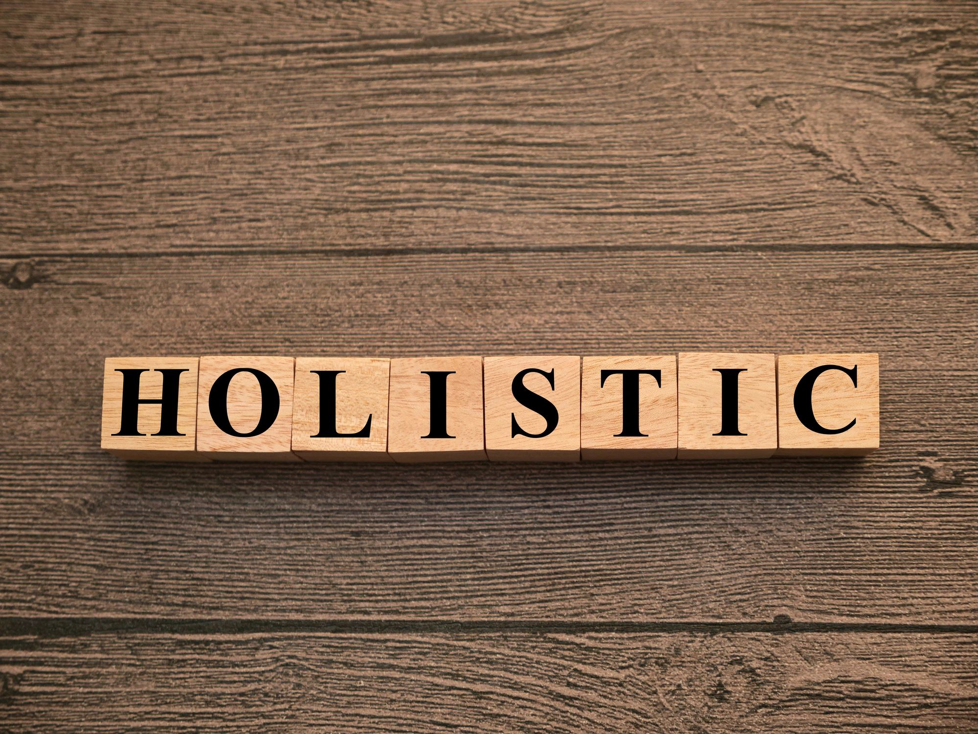 Holistic wooden letter tiles
